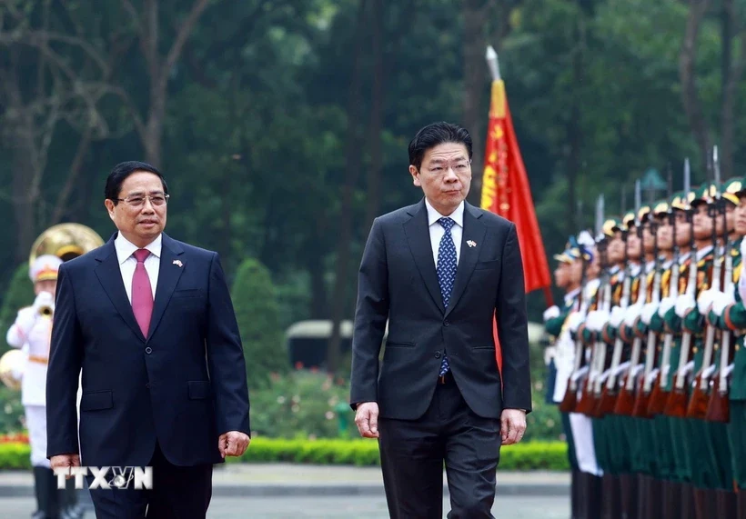 Thủ tướng Phạm Minh Chính chủ trì lễ đón Thủ tướng Singapore và Phu nhân
