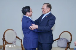 Thủ tướng Phạm Minh Chính gặp Thủ tướng Malaysia nhân Hội nghị BRICS